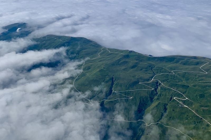 Helicopter above the clouds